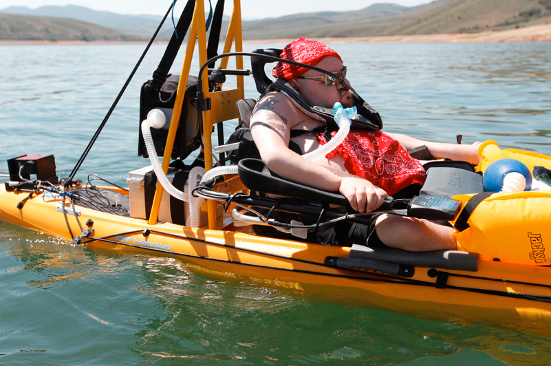 (Al Hartmann | The Salt Lake Tribune) Danny Salazar uses a device developed by engineers at the University of Utah to steer a sailboat by sipping or blowing into a tube. He had never been on the water in his life but sailed for the first time at East Canyon Reservoir with TRAILS. TRAILS stands for Therapeutic Recreation & Independent Lifestyles that helps people with spinal cord injuries learn how to do outdoor-related activities like kayaking, sailing and camping.